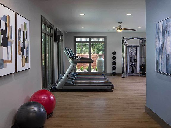 Fitness Center with Treadmills, strength training and large windows