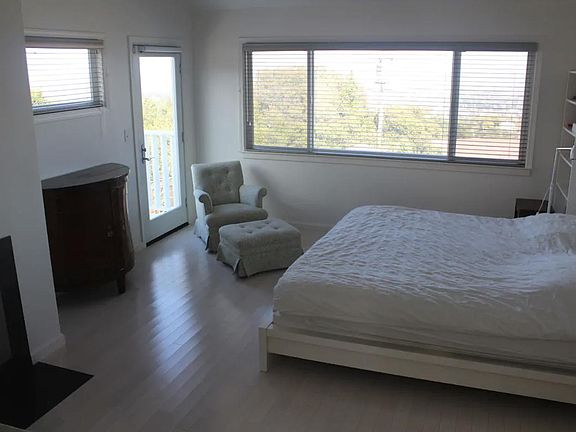 Master bedroom has a king size bed, and beautiful view of the Bay.
