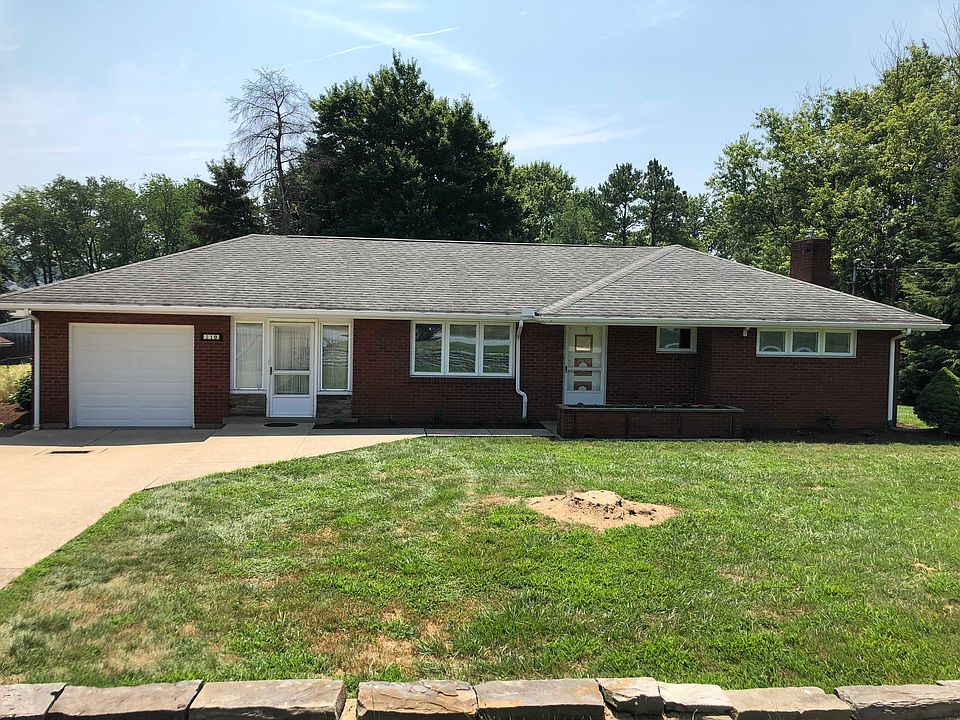 310- Solid Brick,  .64 acre.