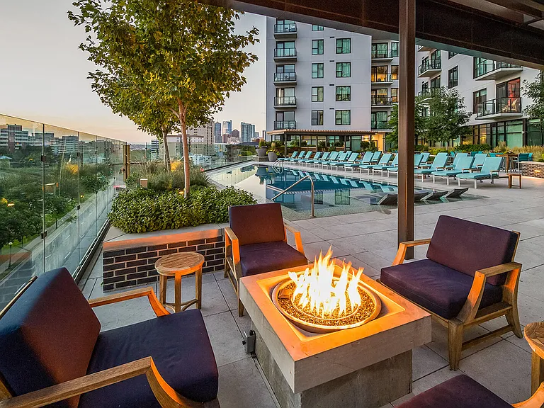 Sit fireside on the pool deck
