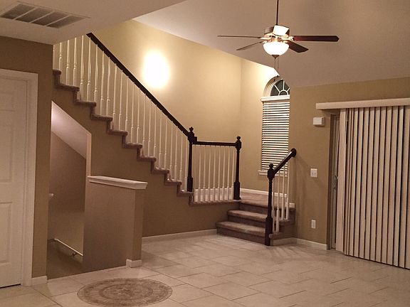 Main Floor Sliding Door To Balcony & Staircase to 3rd Floor