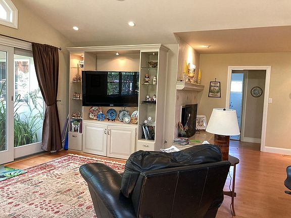 Family room next to Kitchen with French doors leading to the back patio
