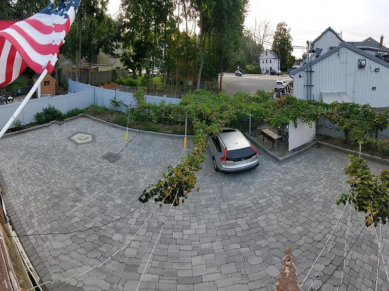 Back yard, parking area