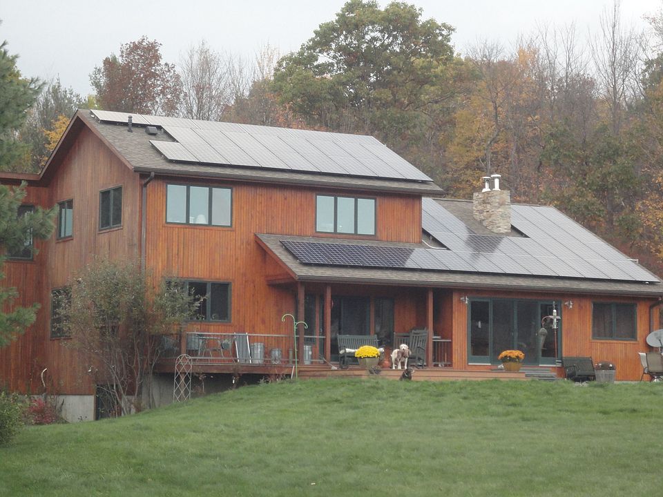 Solar panels, cypress siding