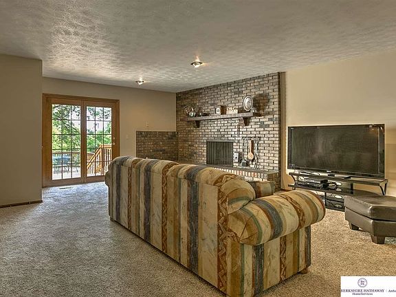 Just professionally painted.  Notice the fireplace and walkout to a huge deck in back for entertaining.