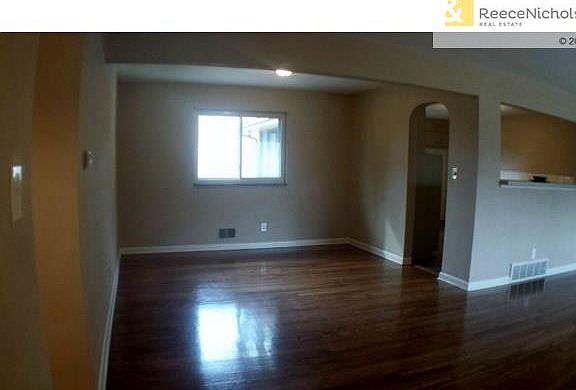 Notice arched door frame to kitchen. Check out granite window si