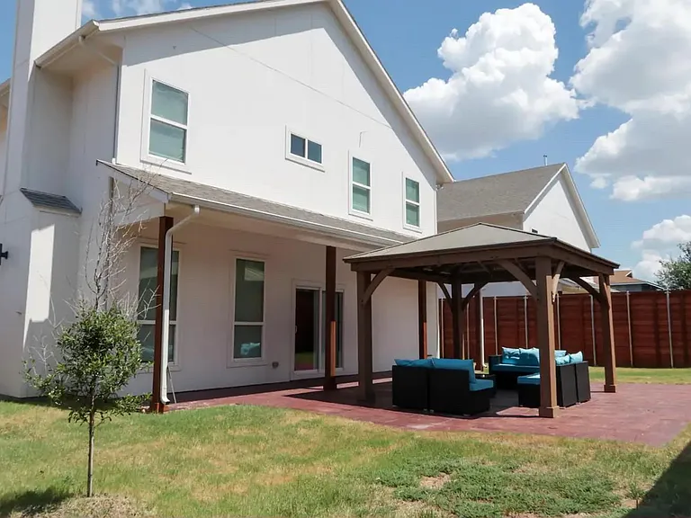 Huge backyard with a Gazebo and 8 foot Fence