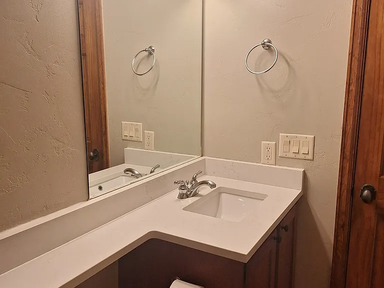 Middle bathroom sink and vanity.