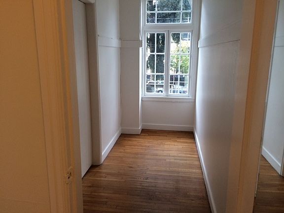 Huge walk in closet in hall, most use as an office