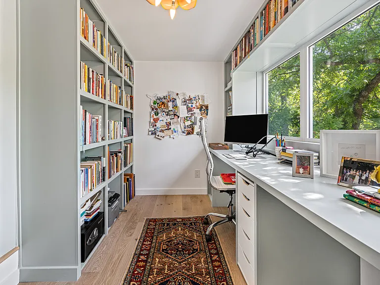 Upstairs office with two built-in desks.