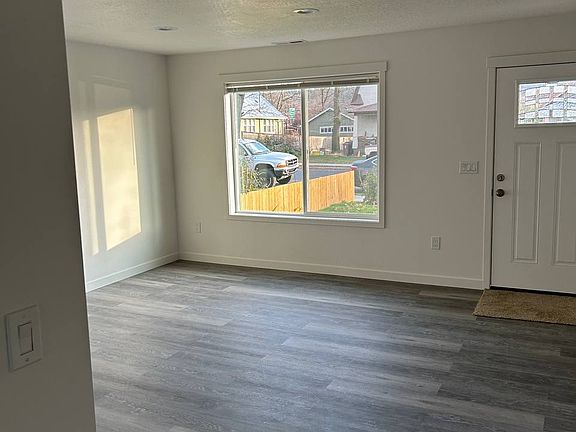 Living Room viewed from main hallway to the kitchen