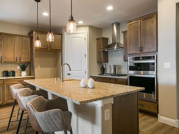 Kitchen features brand-new stainless-steel appliances.