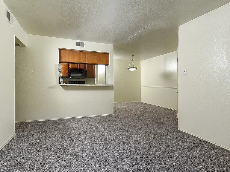 Living and Dining in our Classic Apartment Home.