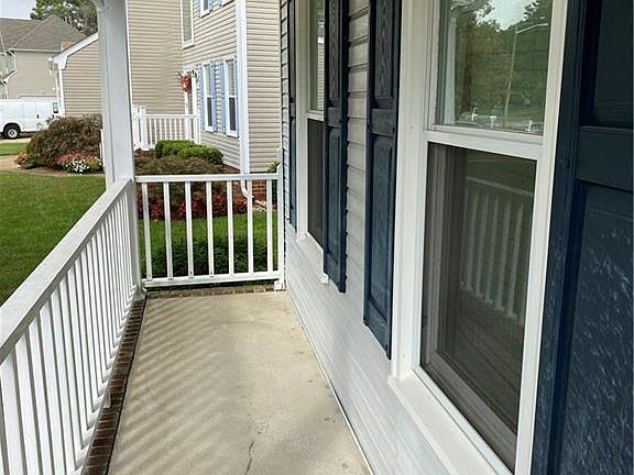 Lovely front porch, ideal for sitting and visiting