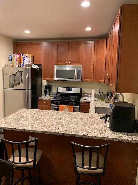 Beautiful countertop and bar stools.