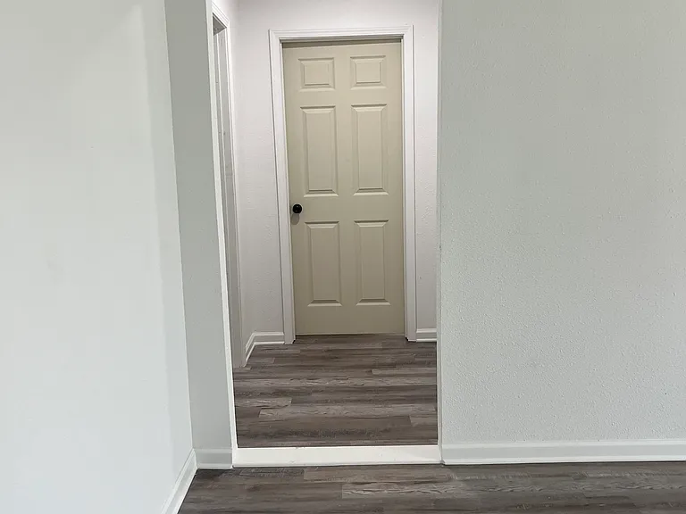 Walkway to the laundry room and bedroom #3