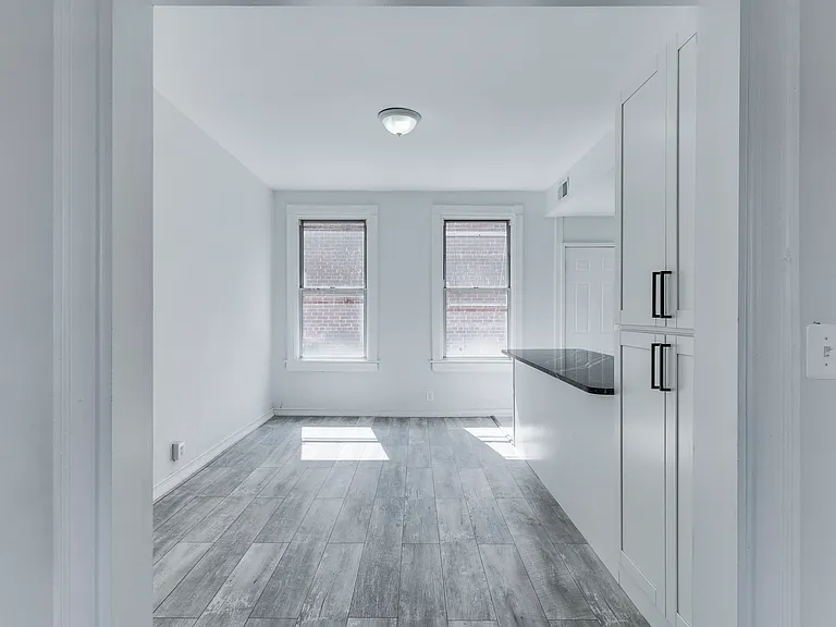 The first-floor windows have been replaced with brand-new, energy-efficient windows.