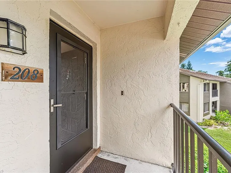 5857 Rattlesnake Hammock Rd #208 — Photo 3