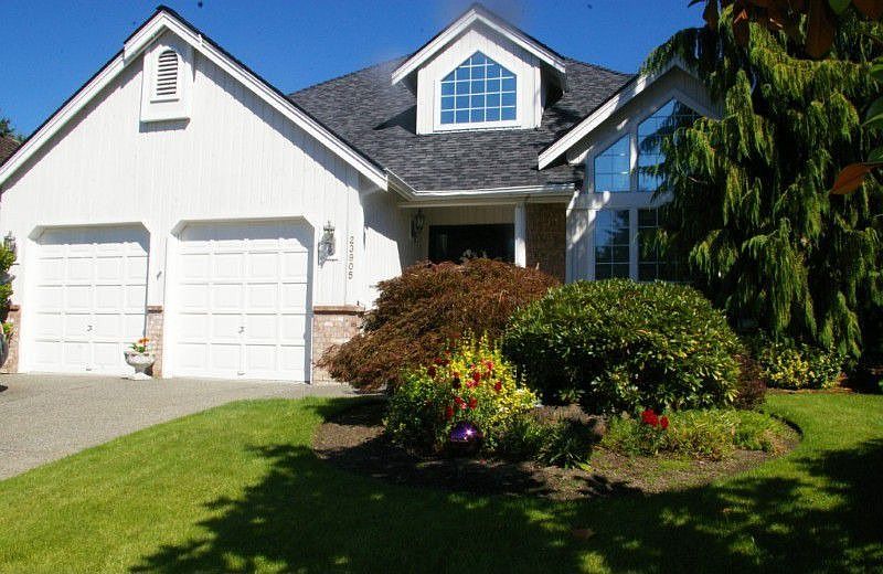 Professionally landscaped yard. Newer roof.