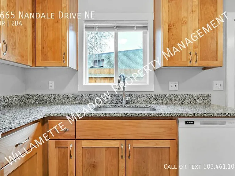 4665 Nandale Dr NE — Photo 2