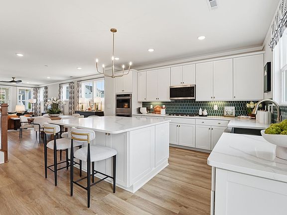 The kitchen of the Aiden single family home by Brookfield Residential at Wendell Falls.