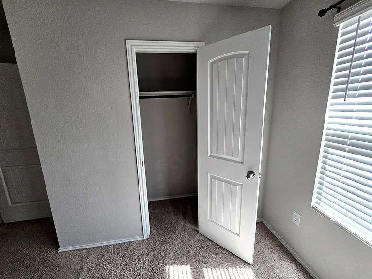 Bedroom 2: Well-sized bedroom ideal for guests, roommates, or office space.