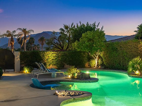 Mountain and palm tree sunset views