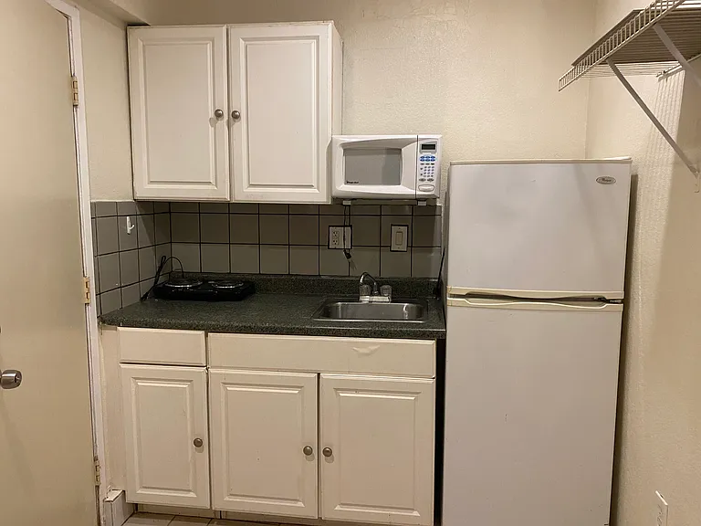 kitchenet,microven,2 electrical grill ,refrigerator ,cabinets