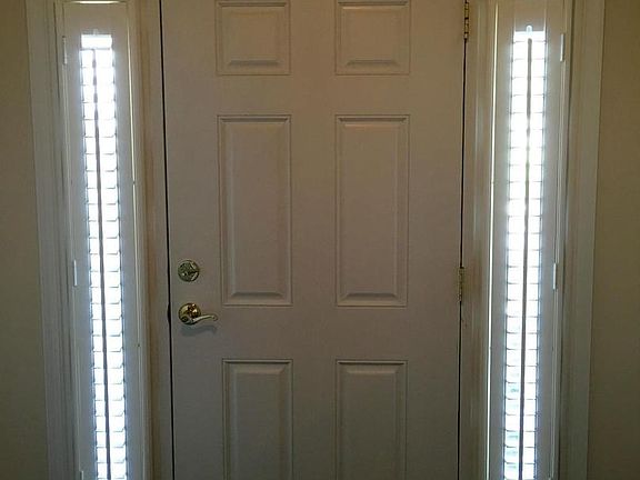 Front Door with Custom Privacy Shutters