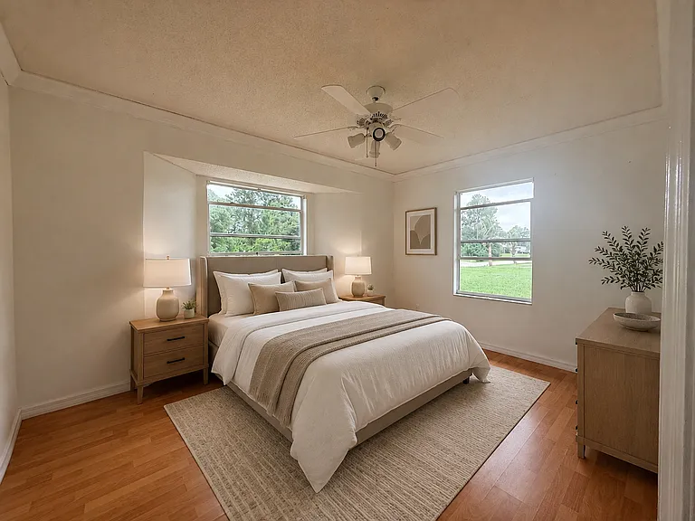 PRIMARY BEDROOM . VIRTUALLY STAGED