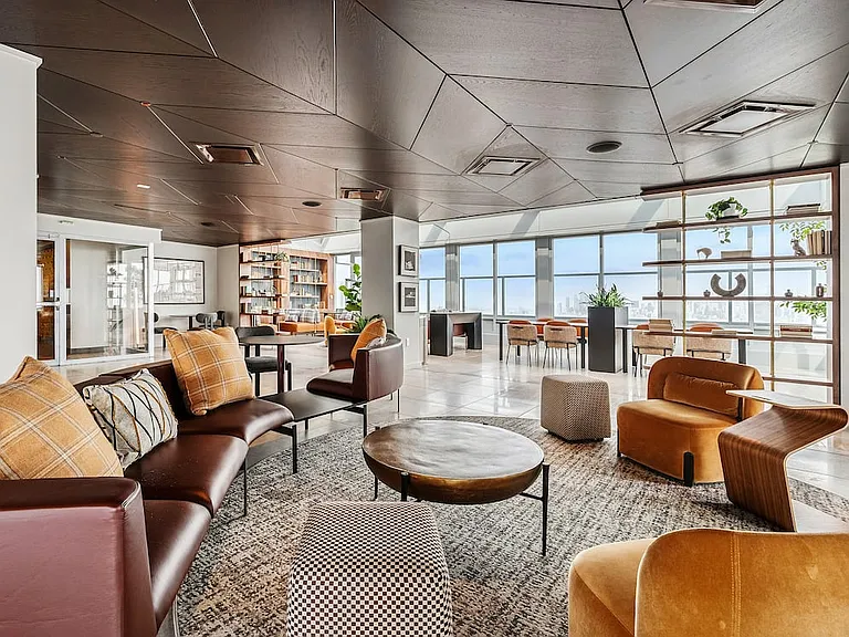 Rooftop lounge with ample seating and coworking spaces