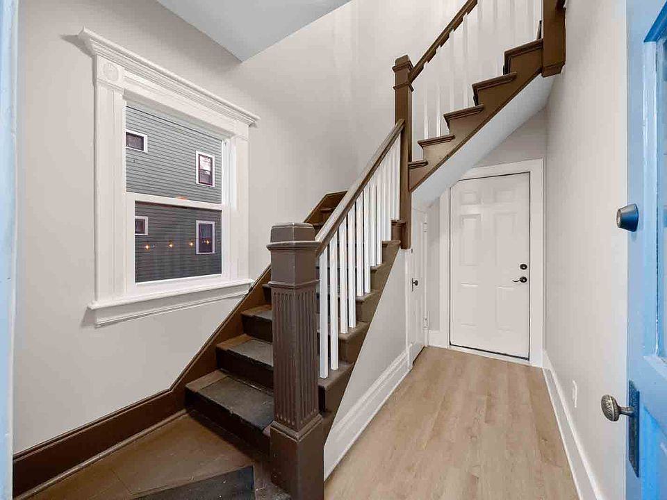 Inside shared entryway to upstairs apartment