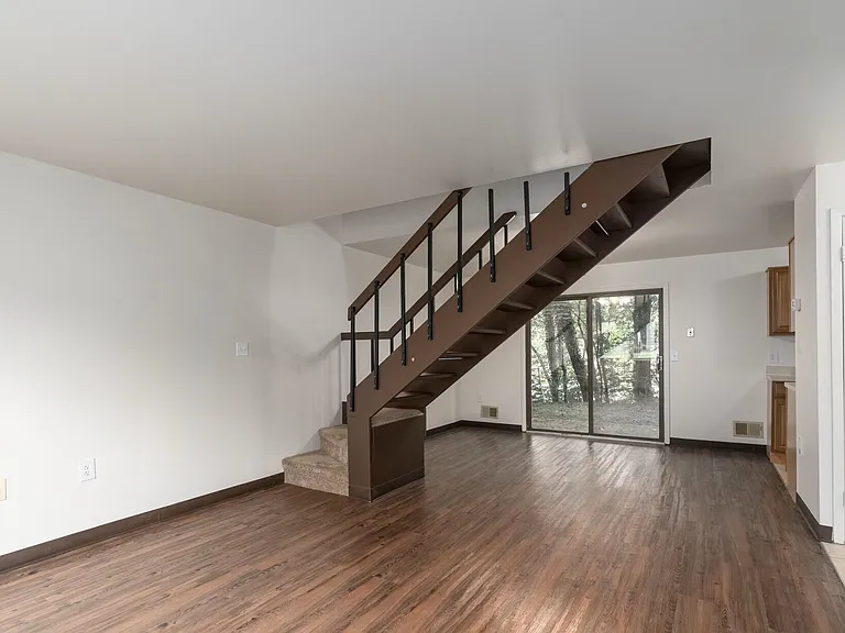 Open space floor plan. View of Living Room to Dining Room.
