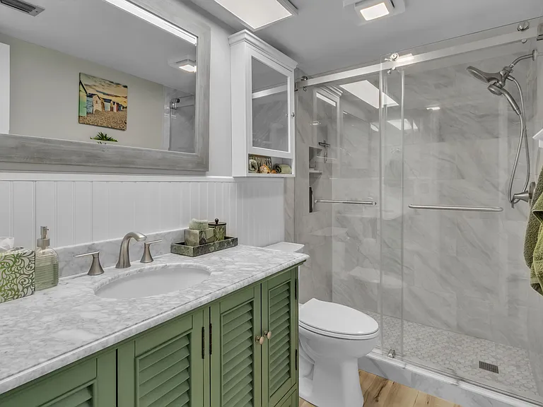 Beautifully upgraded Guest Bathroom w/ an added walk-in shower!