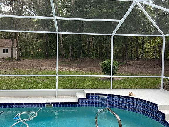Relaxing backyard with pool