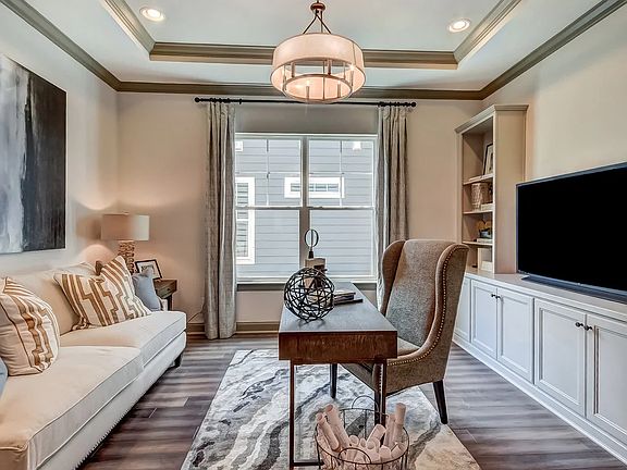 Home office with tray ceiling