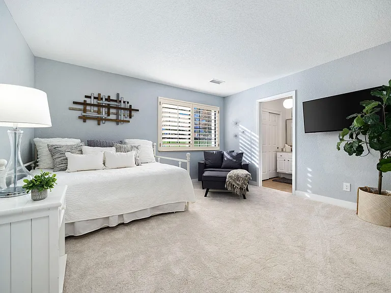 Full size bed with smart TV, private bath and closet.
