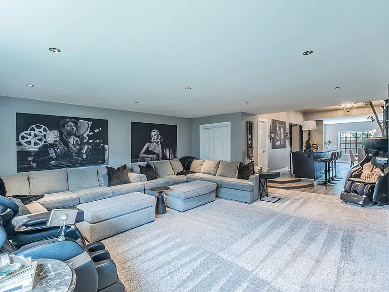 Stretch out and relax in this spacious, designer living area.
