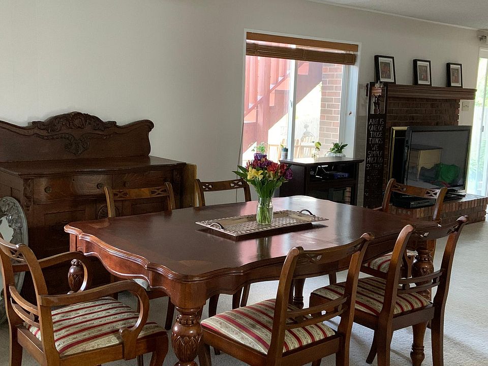 Main living area used as dining area by previous tenant