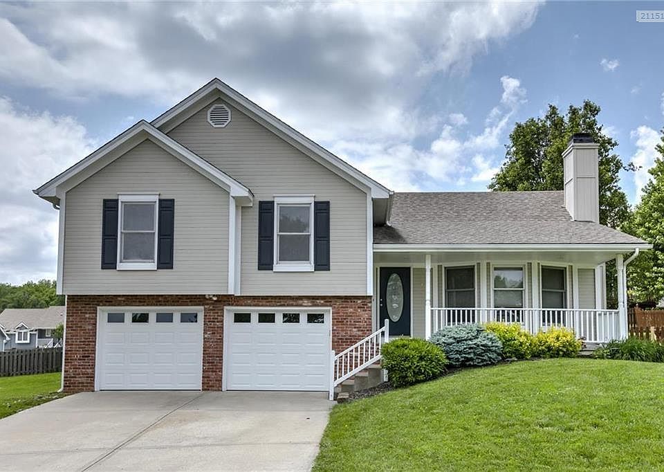 Updated home sits on a 100 x 100 lot.  Welcoming front porch. New insulated garage doors.