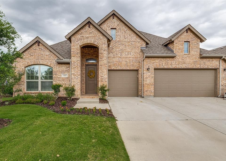 Welcome to your new home!  Great drive up and beautiful inside. 4 or 5 bedrooms, 3 full baths AND a 3 car garage.