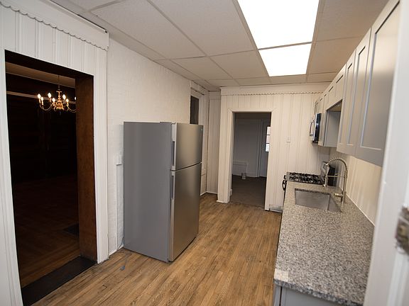 Kitchen with entrance into the living room area.