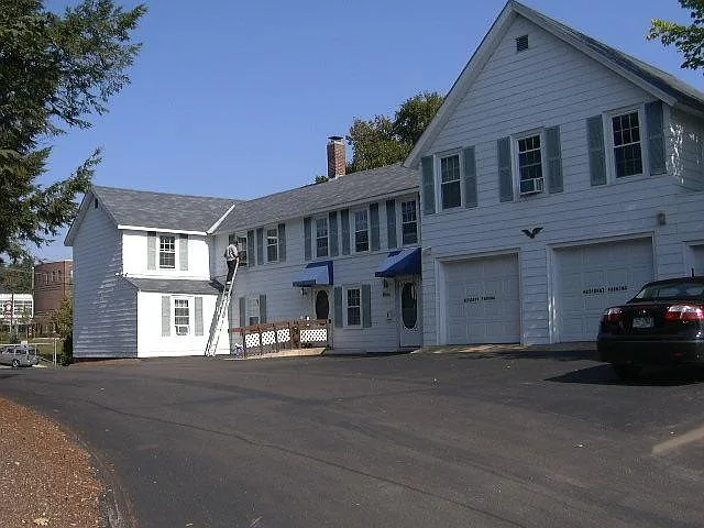 Building from Parking Lot. Garage on left is for this apartment.