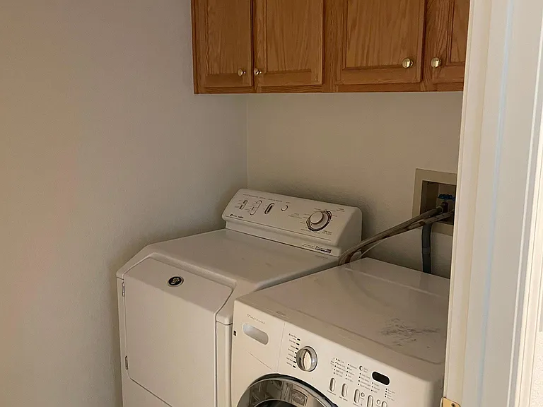 Laundry room with washer and dryer