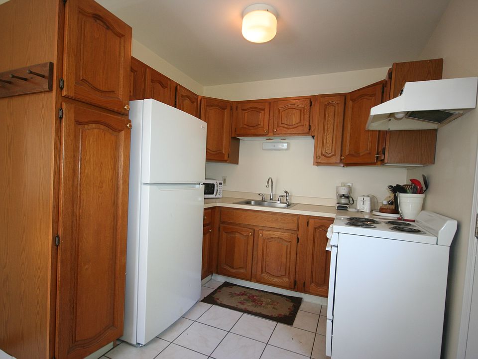 Open kitchen - entire apartment cute and neat as a pin!