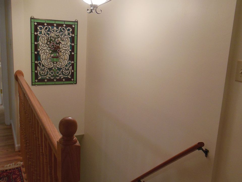 foyer, stairs leading down 