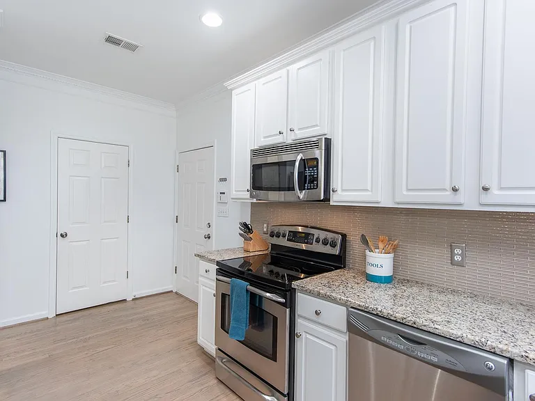 Doors to laundry and garage from the kitchen