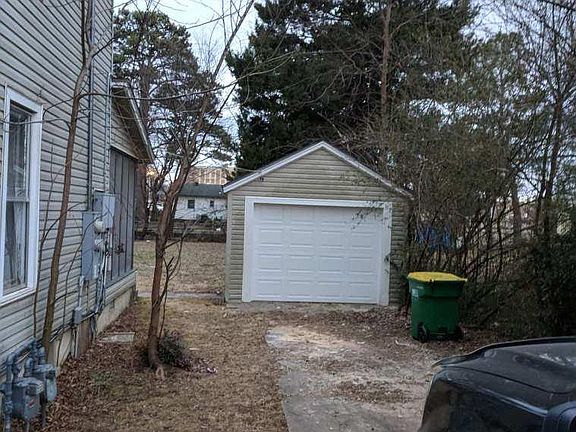 One-car garage with garage opener and plenty of parking spac