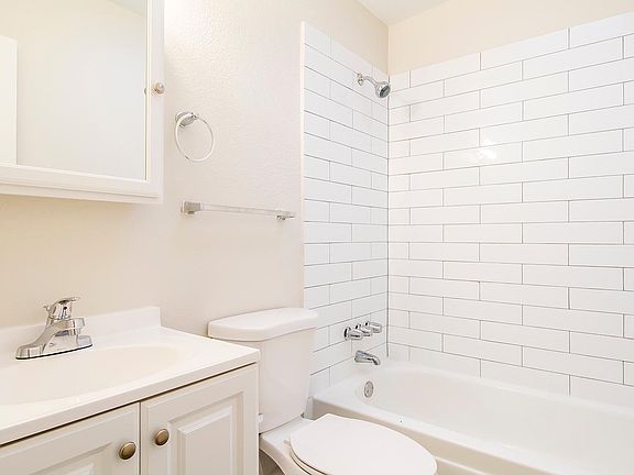 New bathroom with subway tile, tub/shower. new clean everyth
