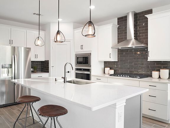 Bright and Open Kitchen with Built In Appliances